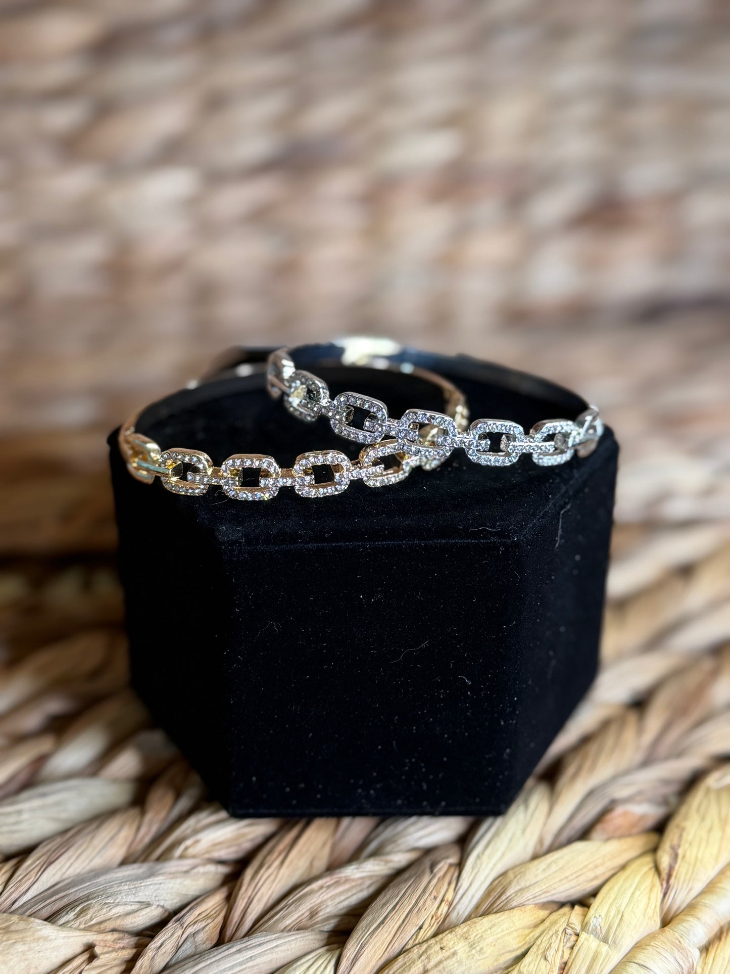 Gold and silver bracelets with clamp closure