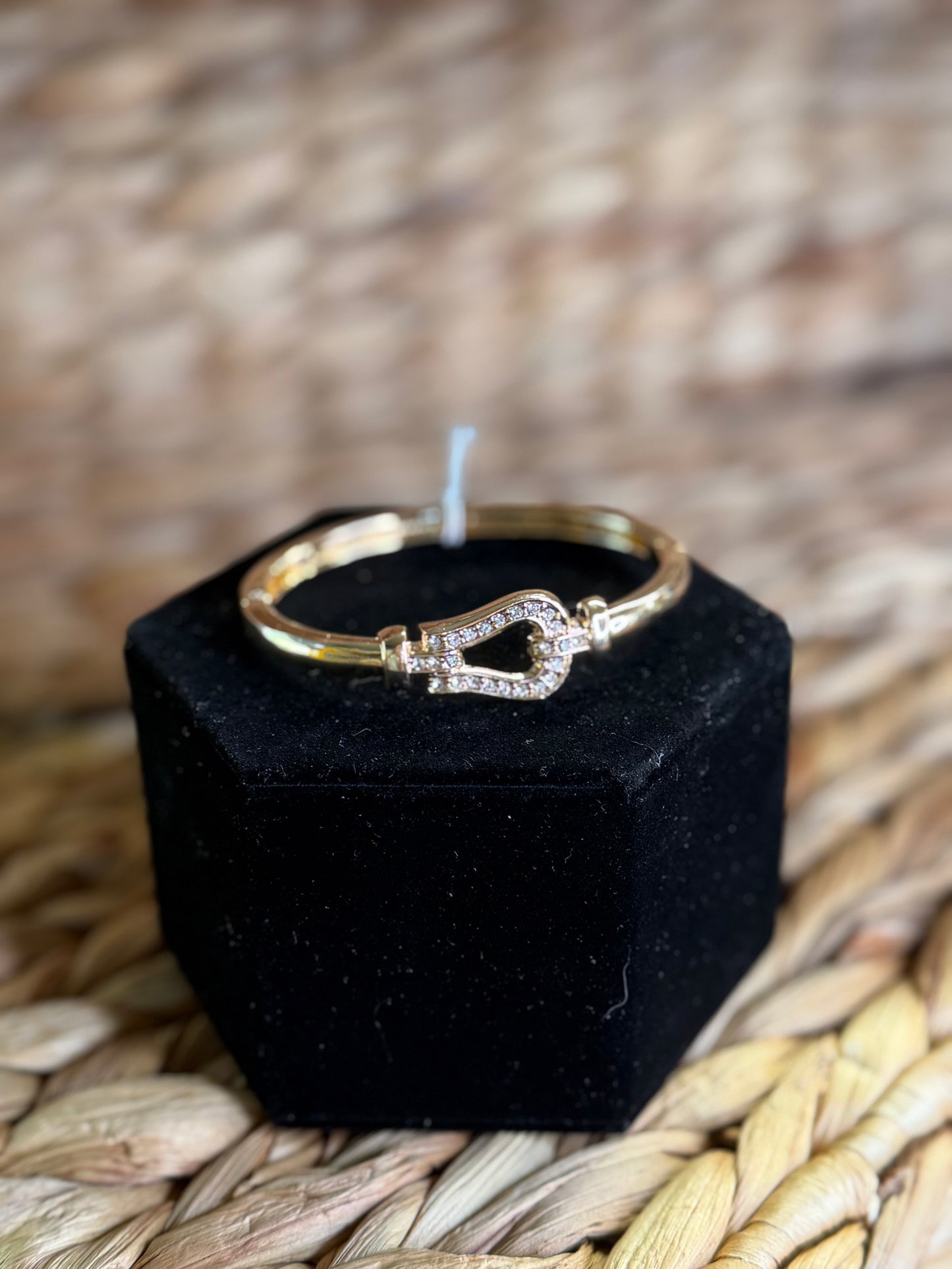 Gold clamp bracelet with diamonds