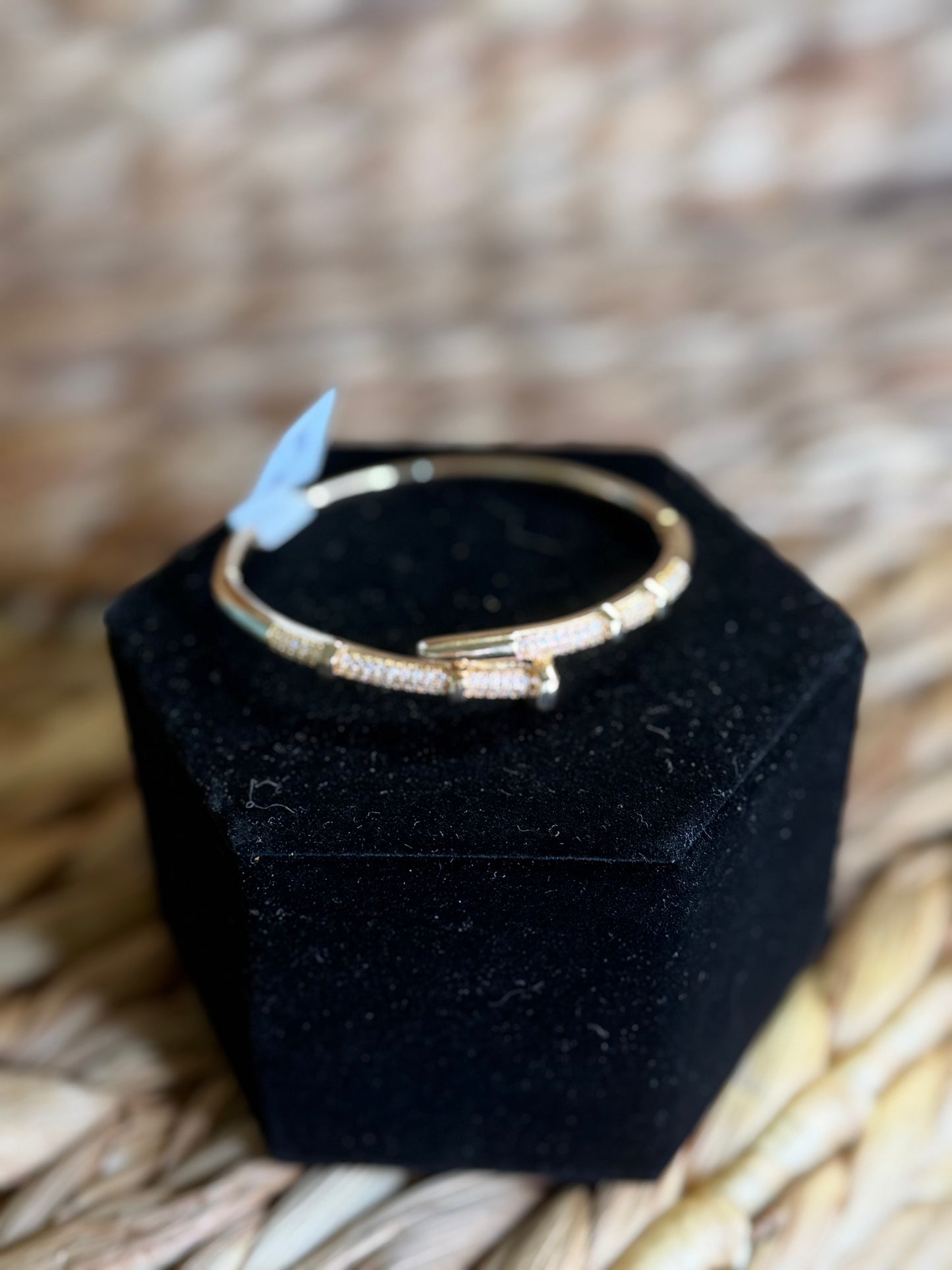 Gold clamp bracelet with golden pavé