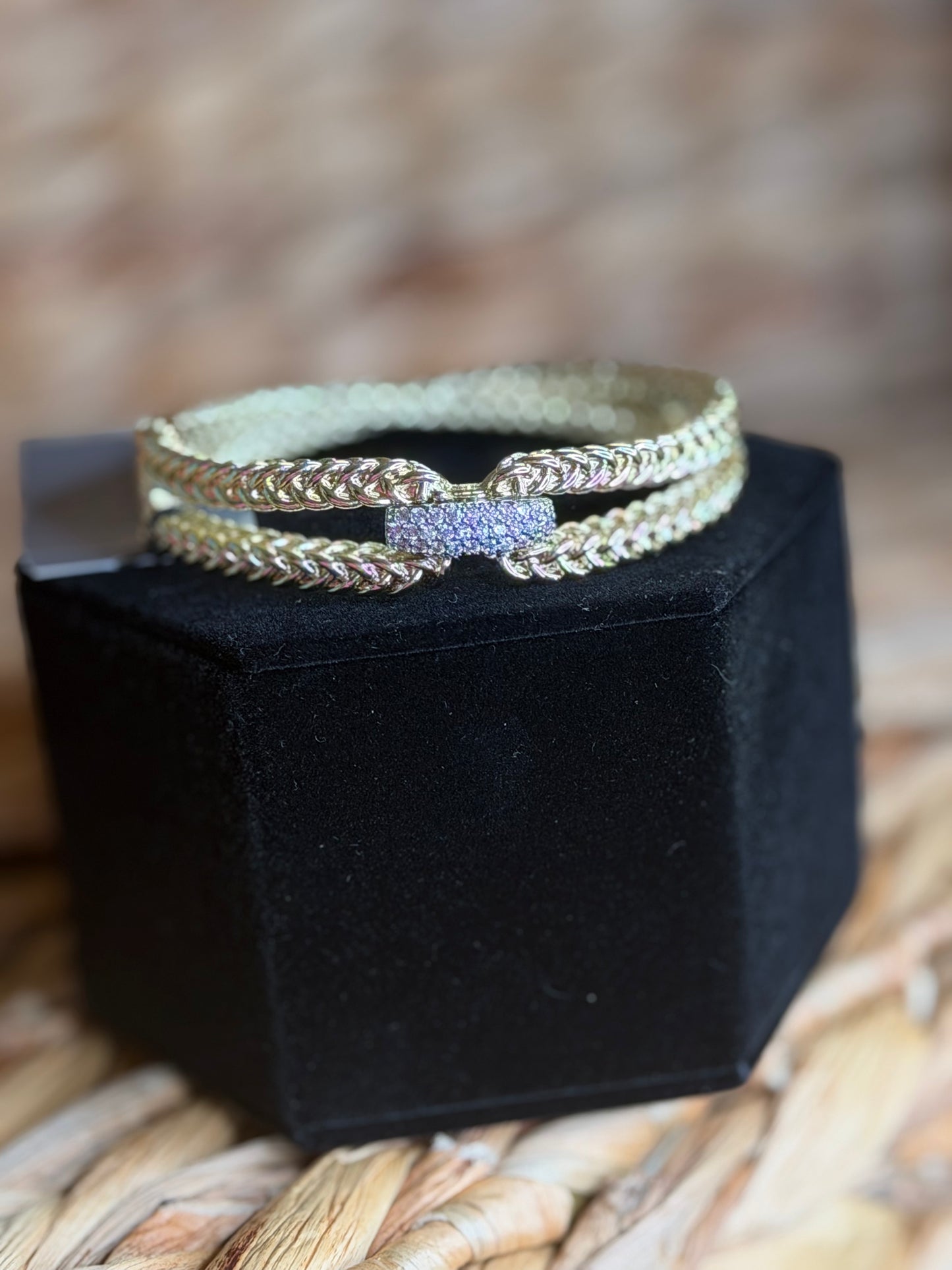 Gold hinge bracelet with pavé center