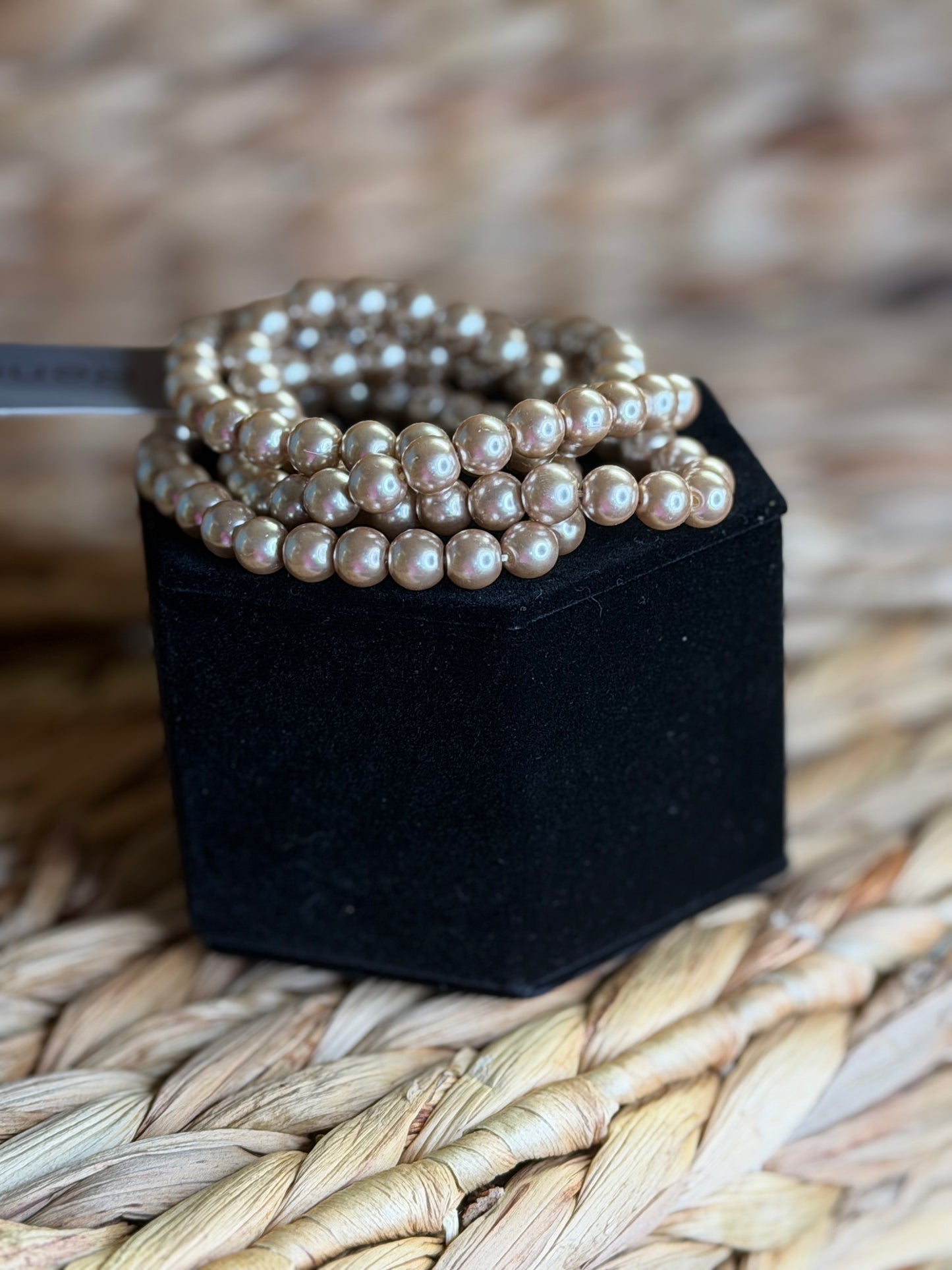 4 stretchy tan color pearl bracelets
