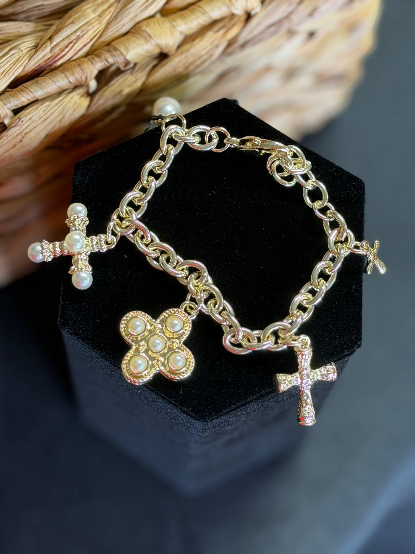 Gold chain bracelet with charms