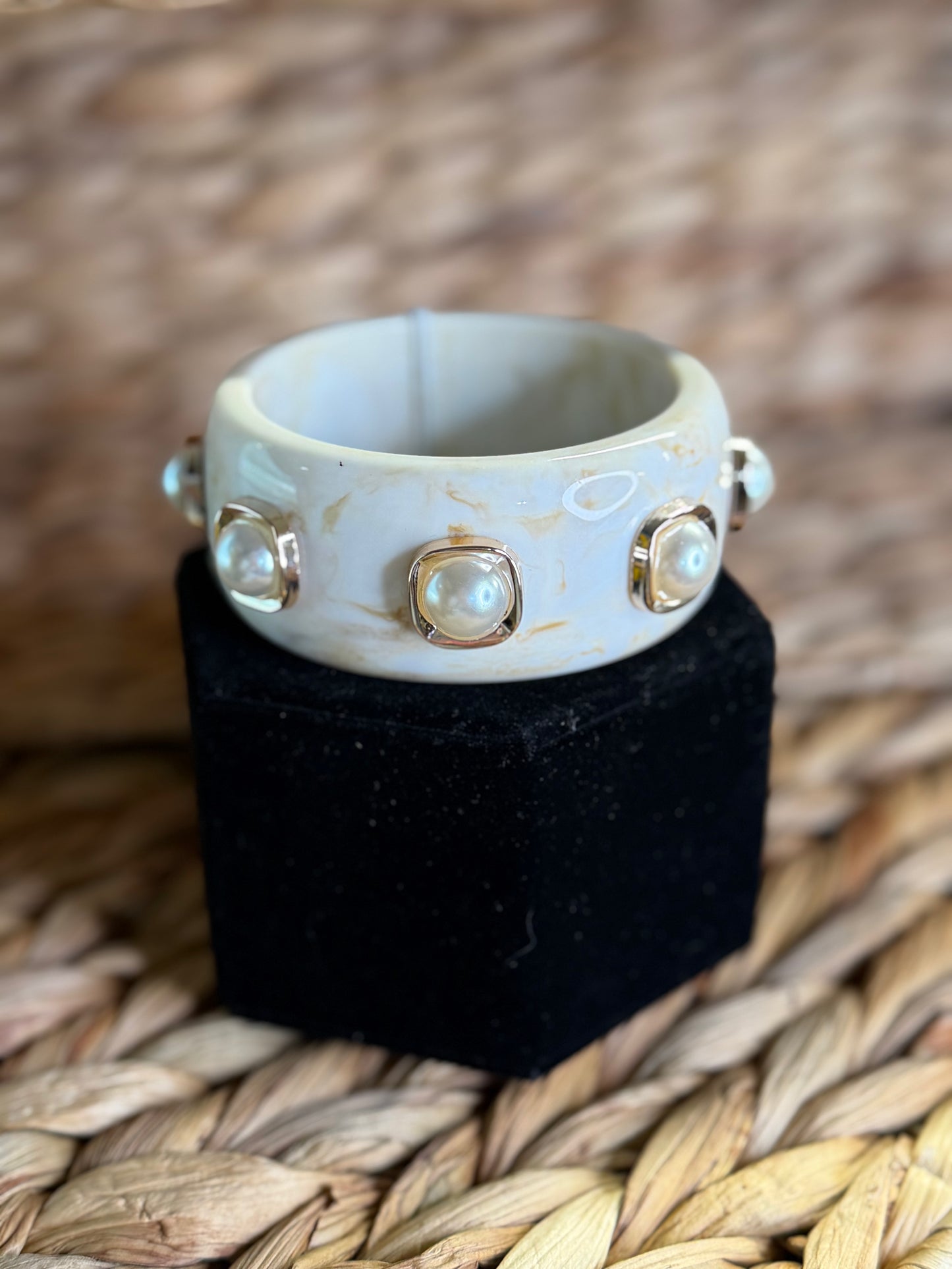 Tan color bangle bracelet with pearls in gold squares