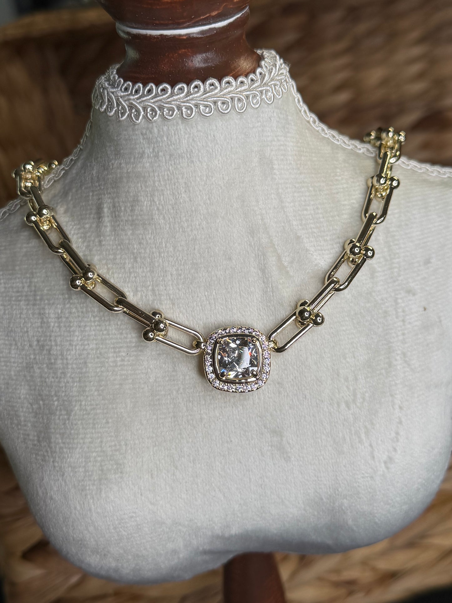 Gold link necklace with square crystal