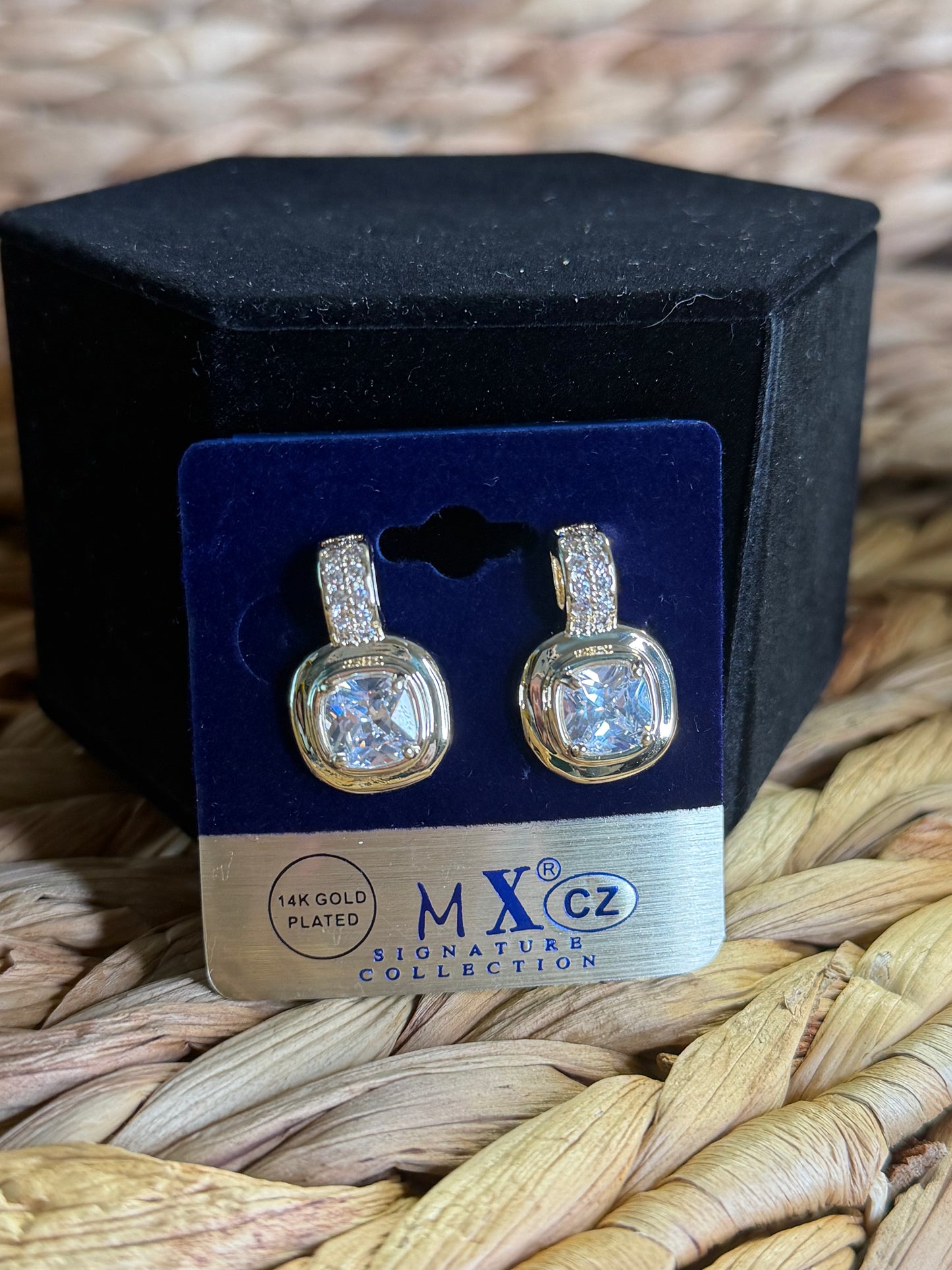Gold earrings with square CZ’s