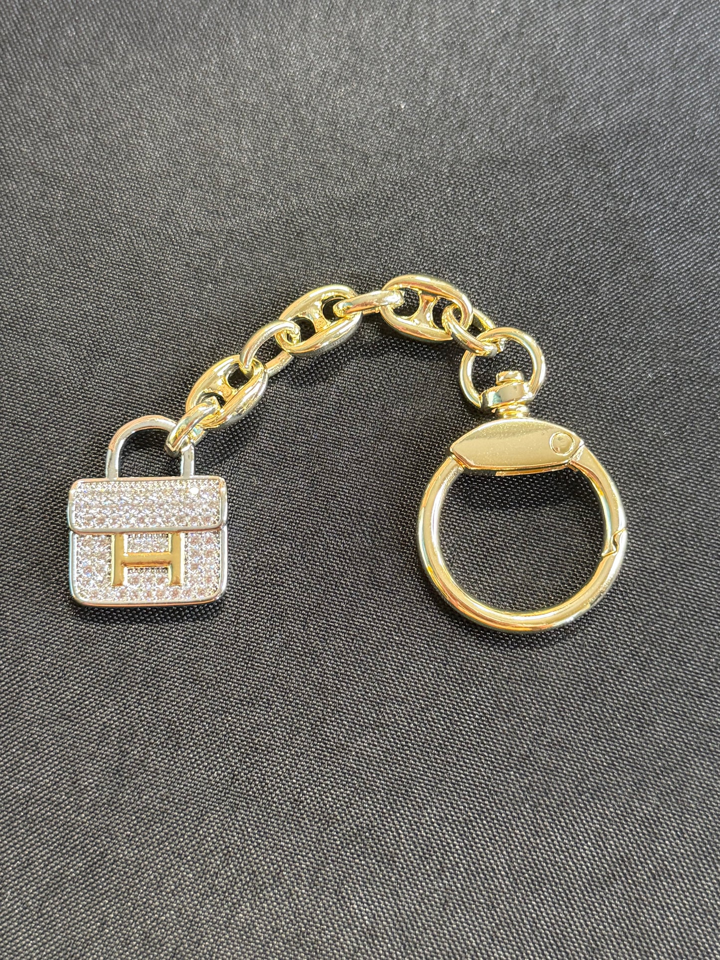 Gold keychain with pavé purse charm