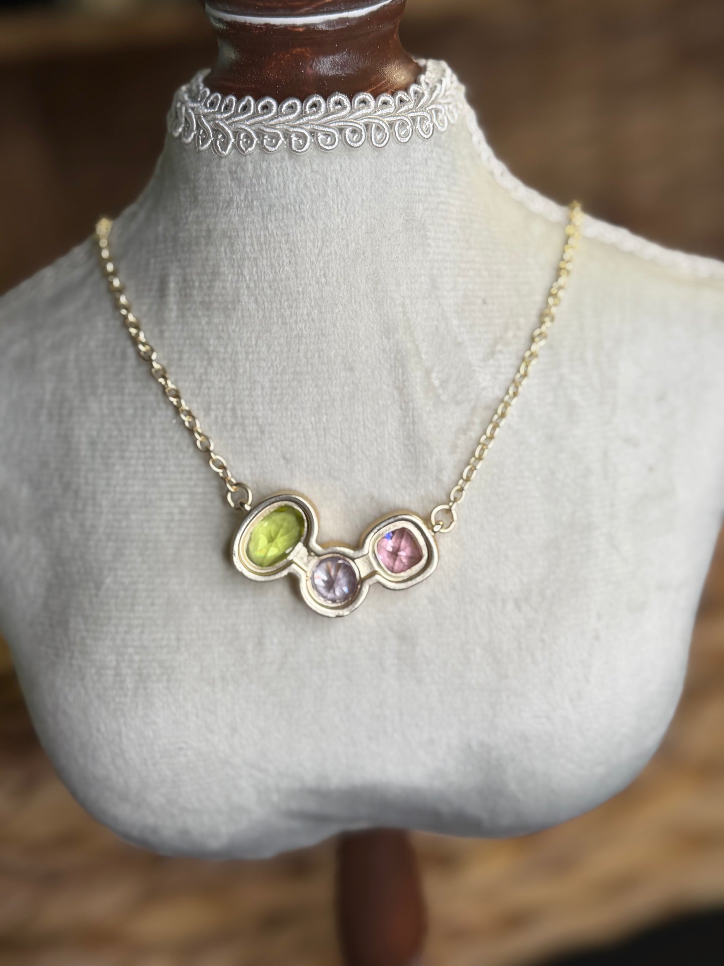 Gold necklace with color stones