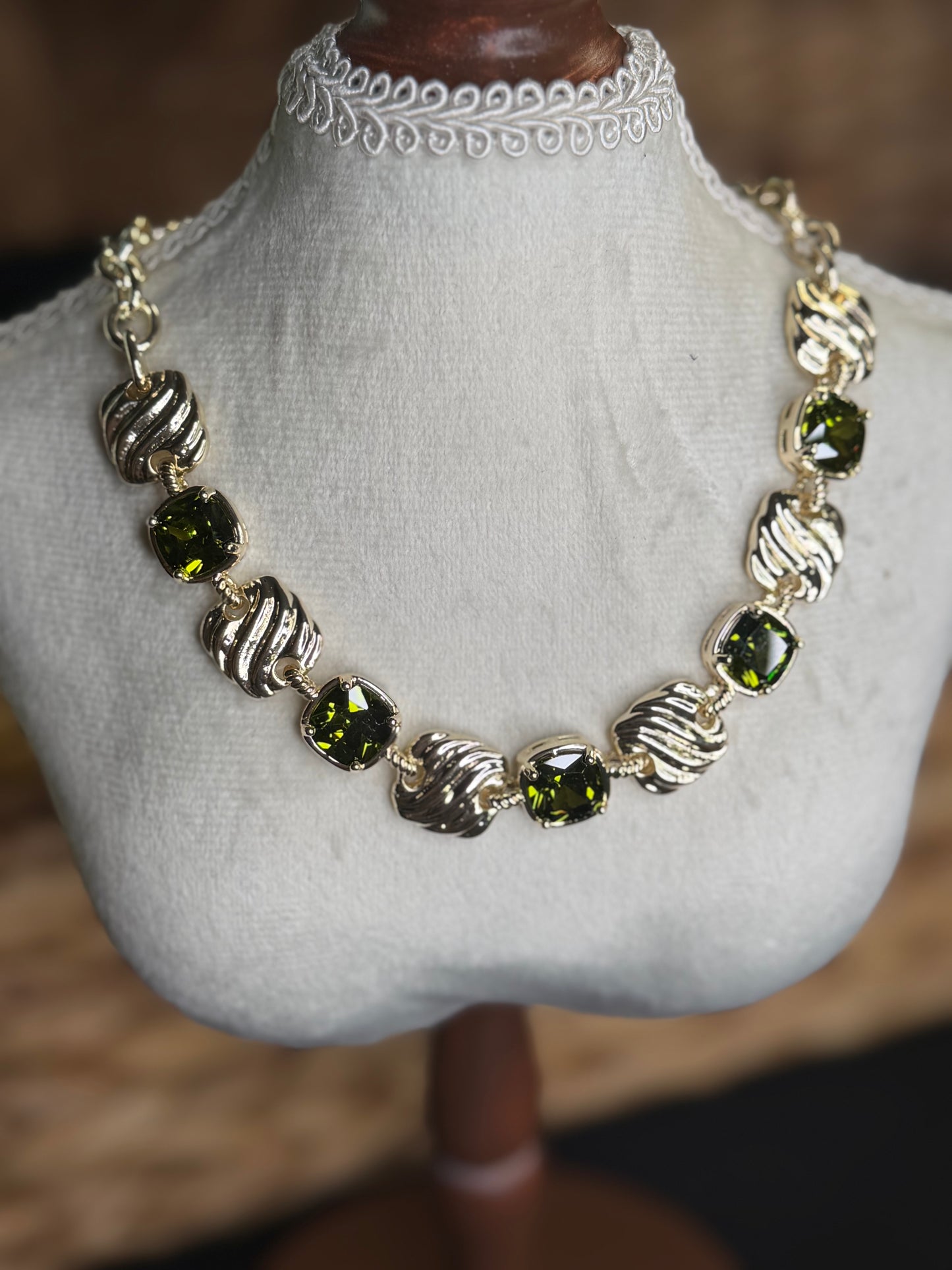 Gold necklace with olive green square stones