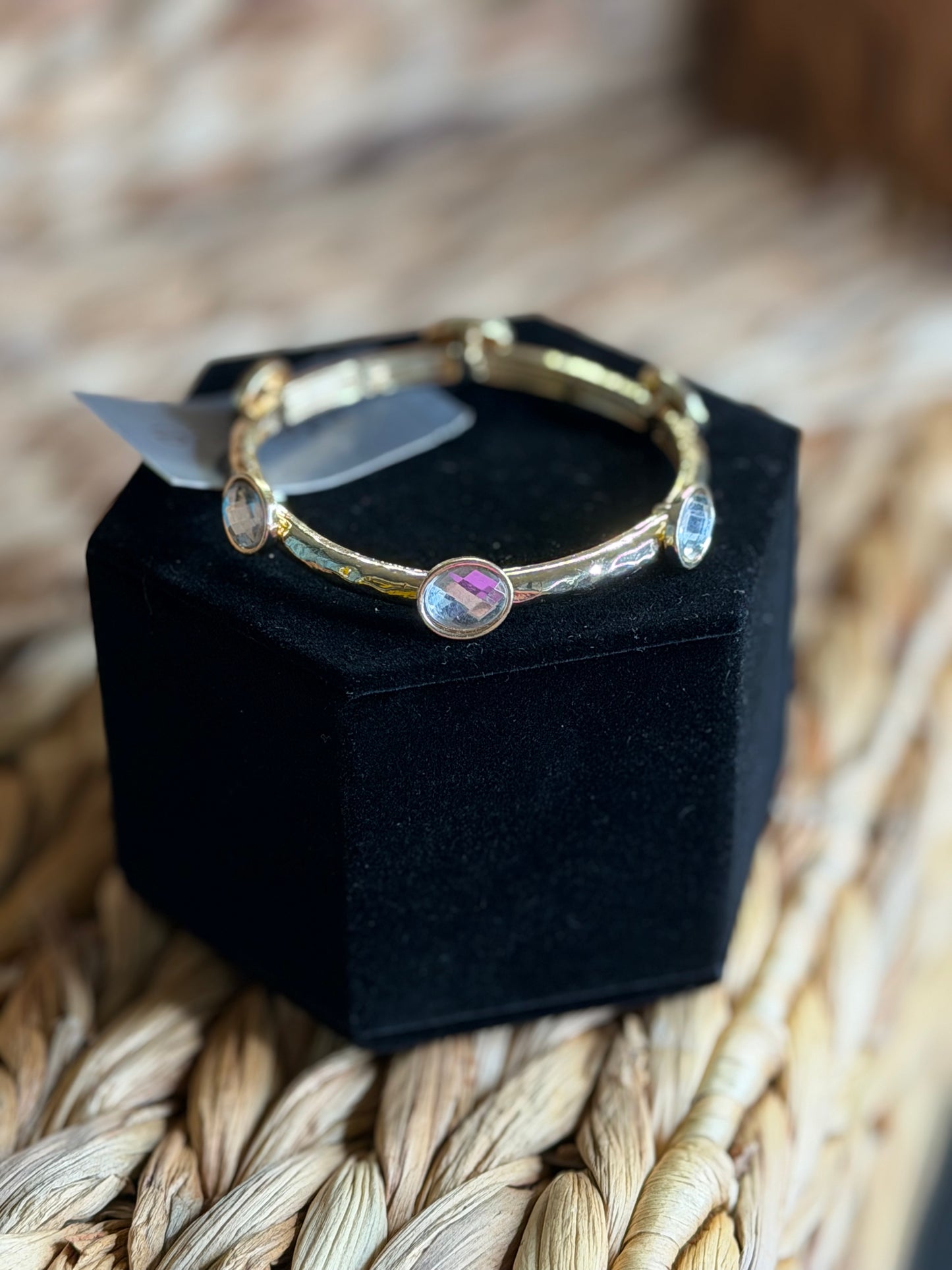Stretchy gold bracelet with stones