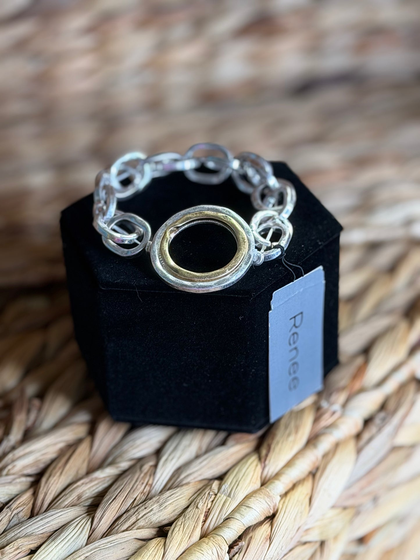 Stretchy silver bracelet with 2 tone middle piece