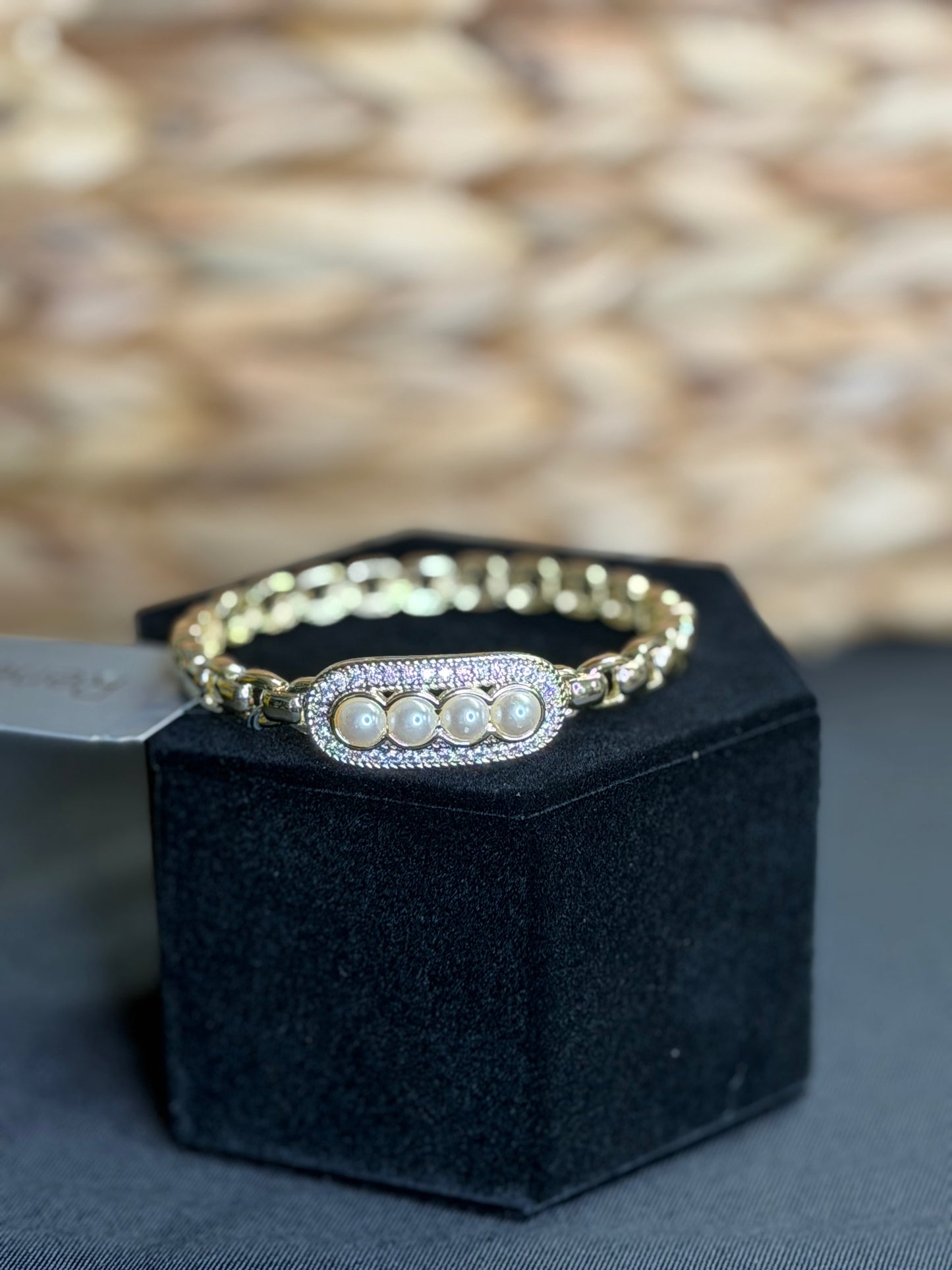 Gold hinged bangle bracelet