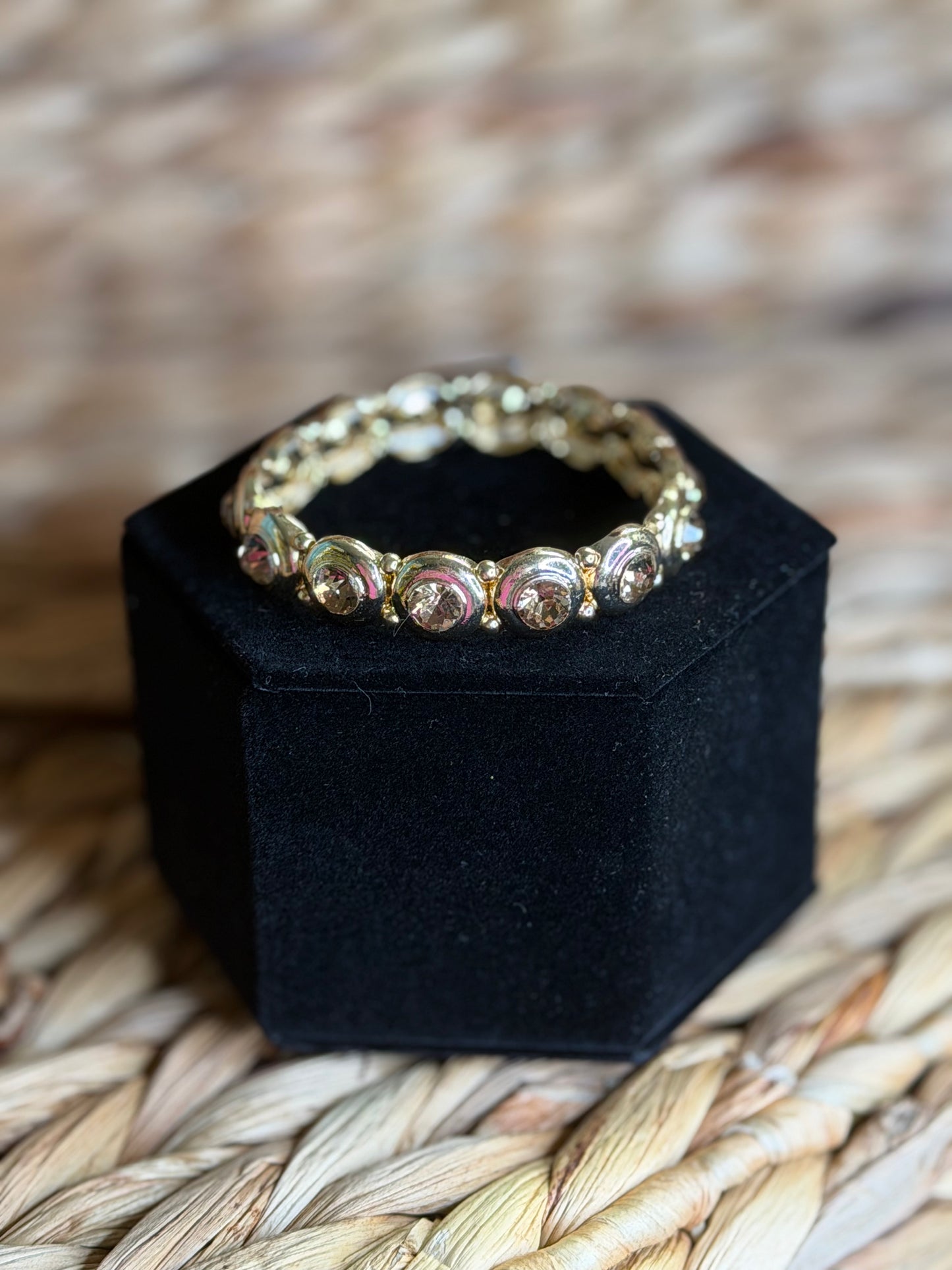 Stretchy gold bracelet with topaz stones