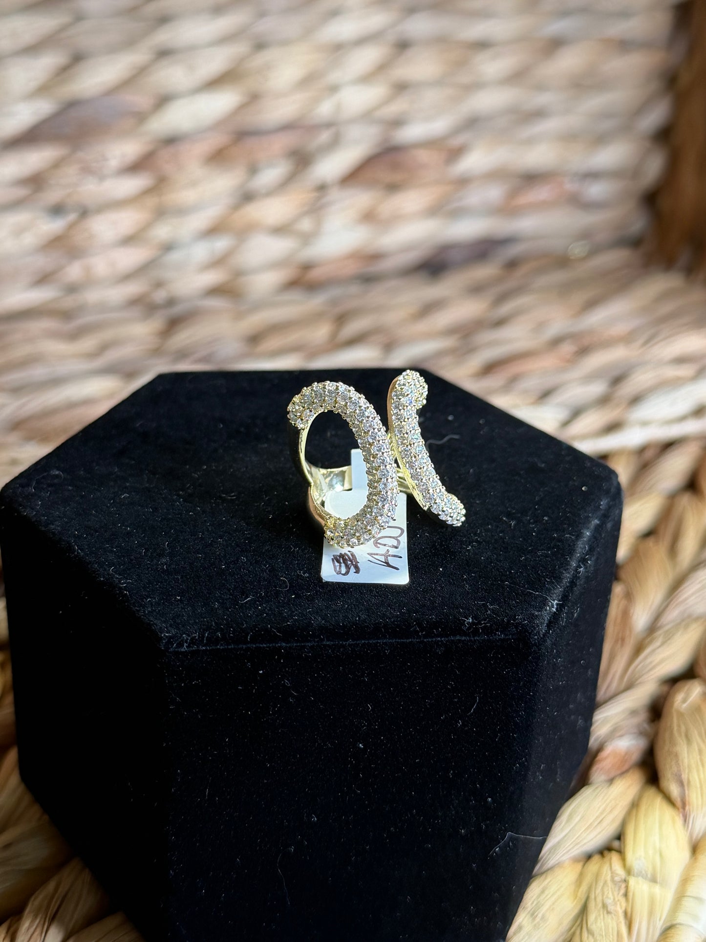 Adjustable gold ring with pavé