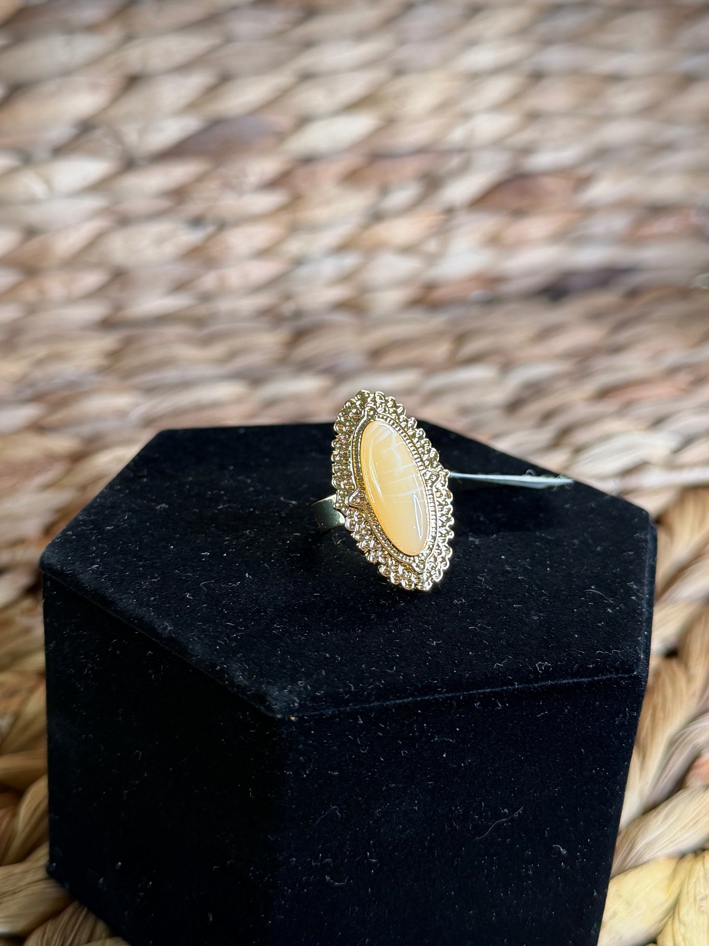 Sizable gold ring with oval stone