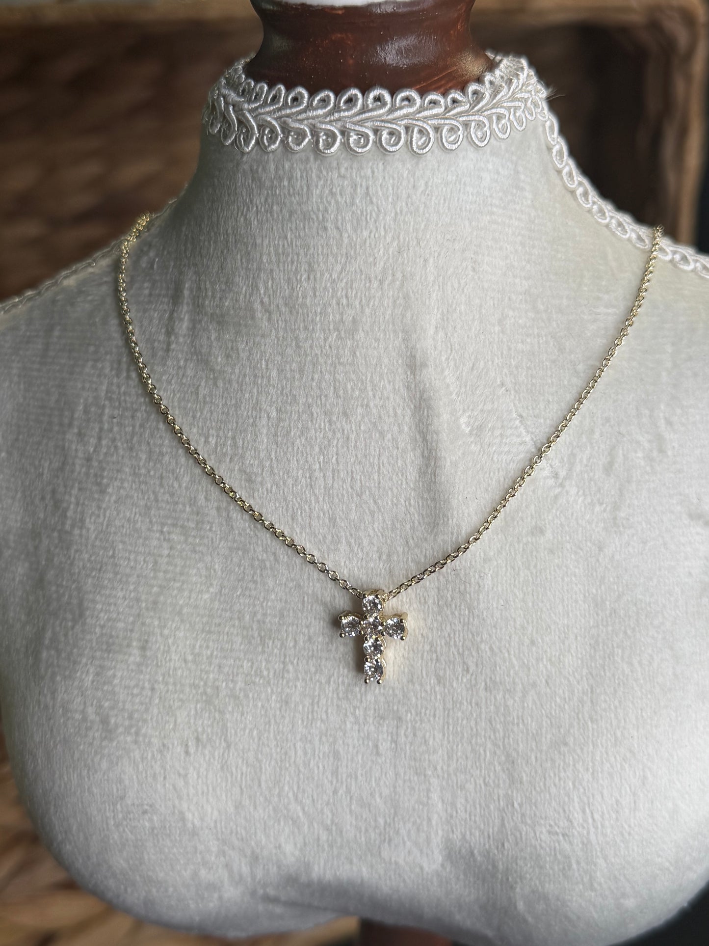 Gold necklace with diamond cross