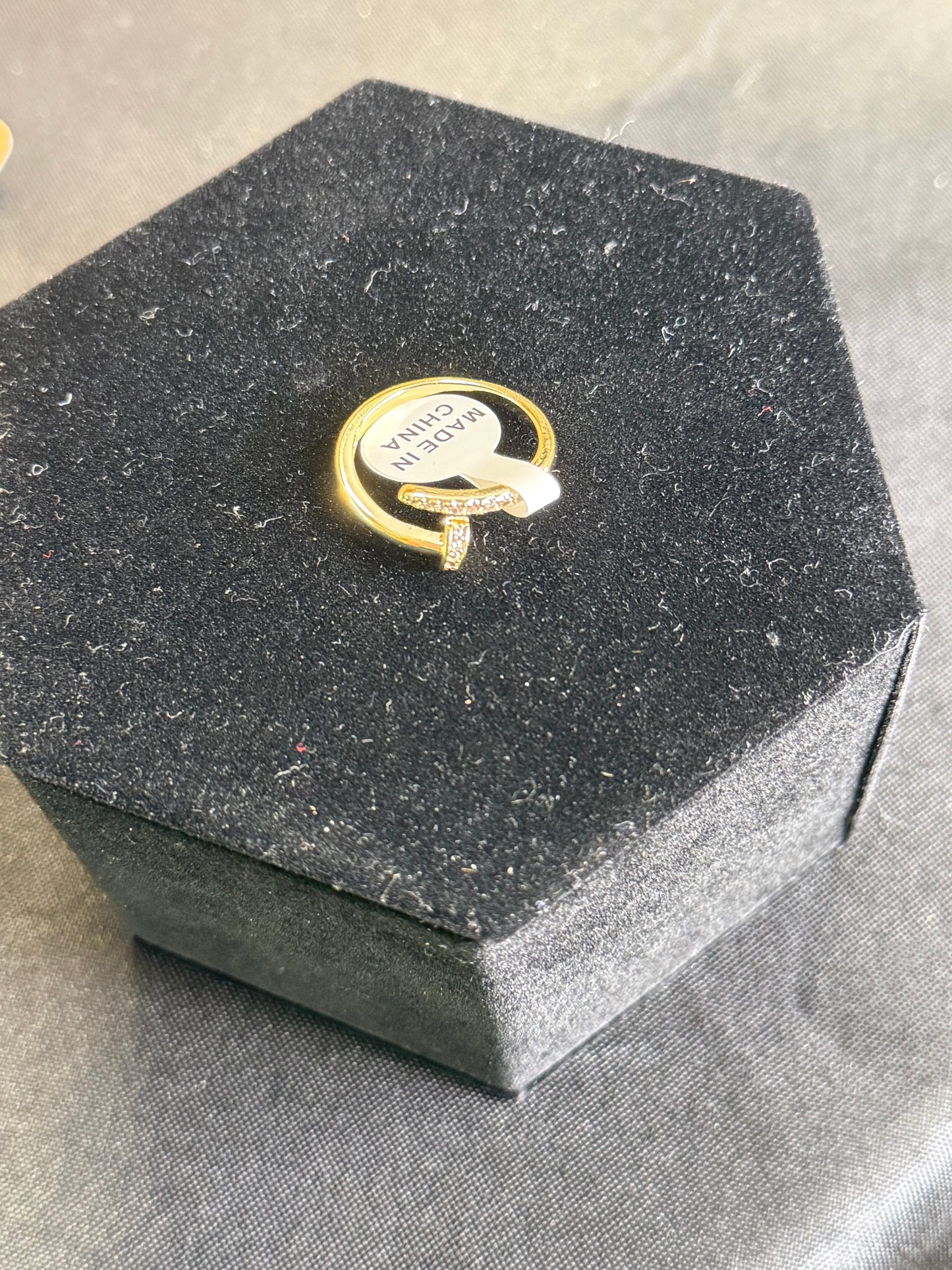 Gold nail ring with pavé cz’s