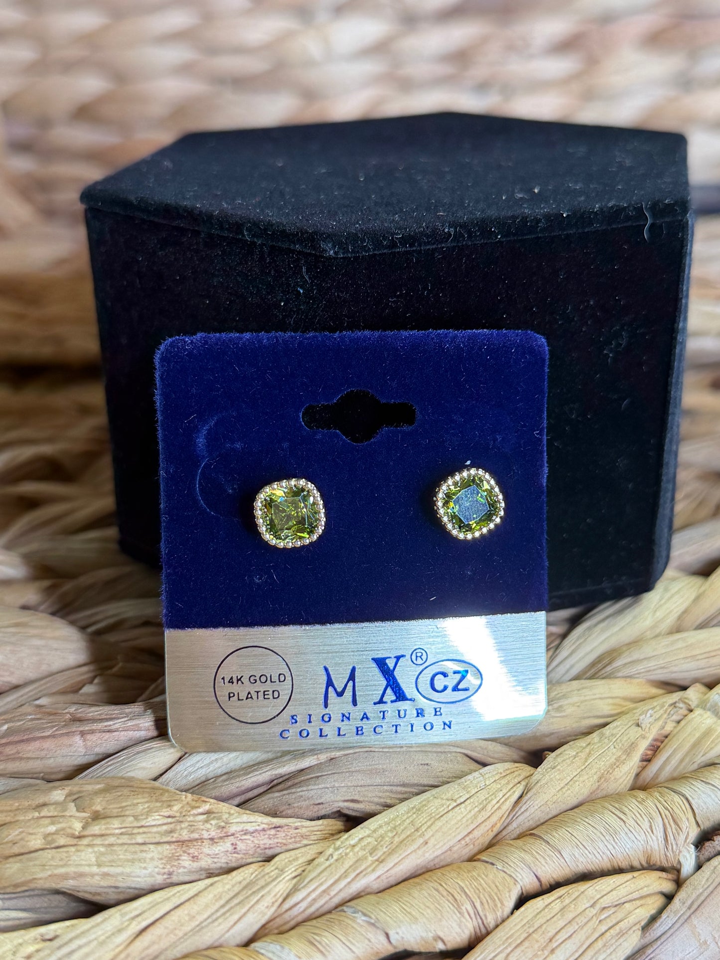 Gold earrings with olive green stone