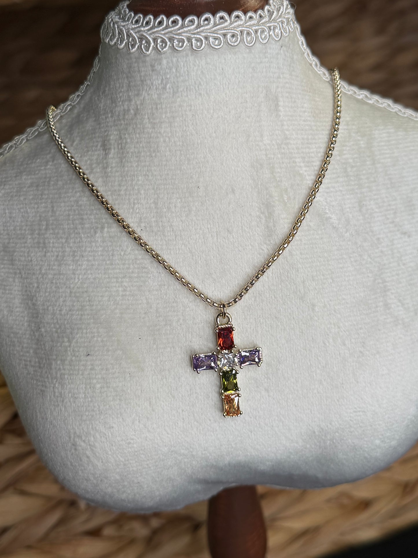 Gold necklace with multi-color cross