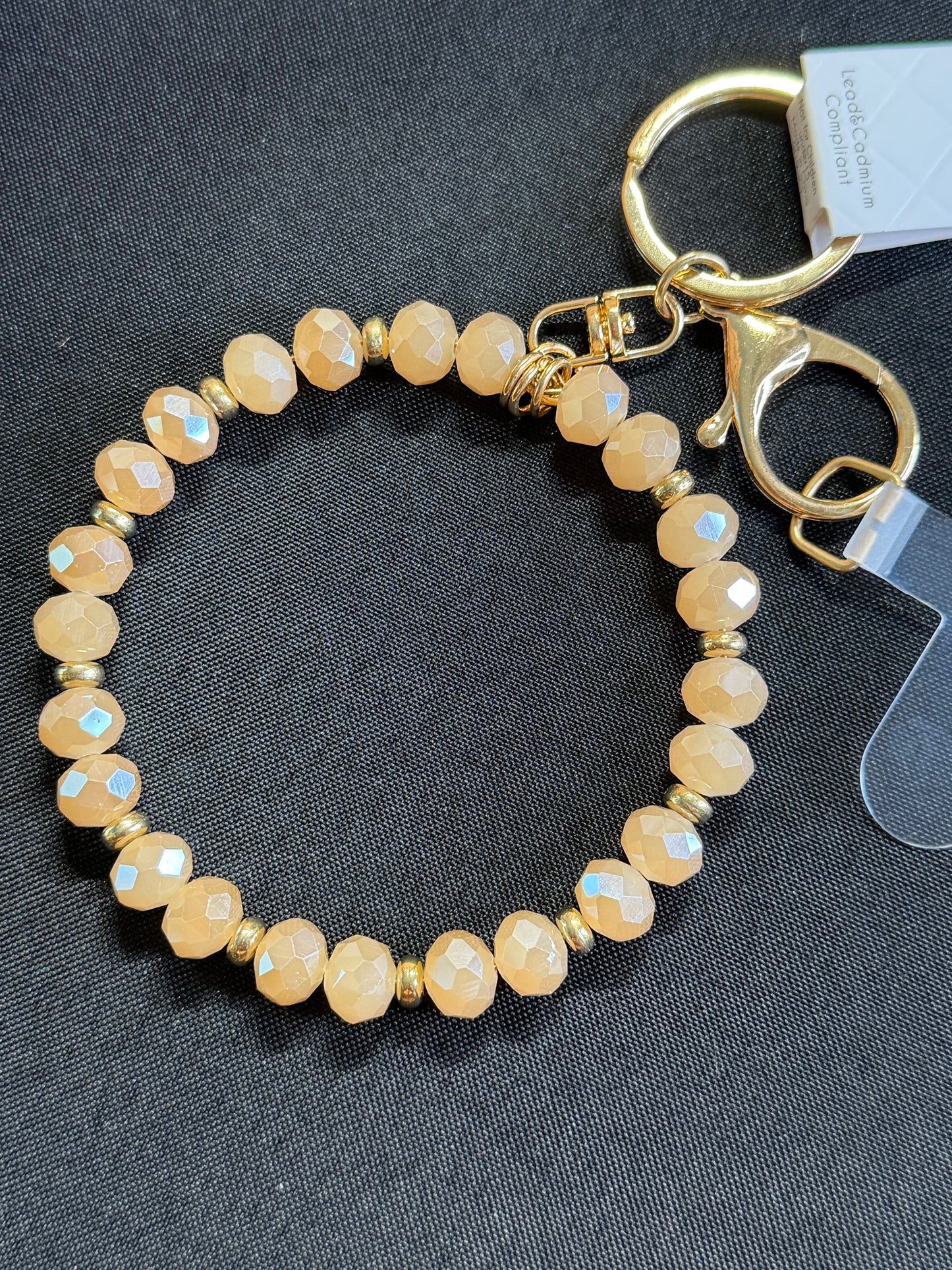 Tan beaded bangle keychain
